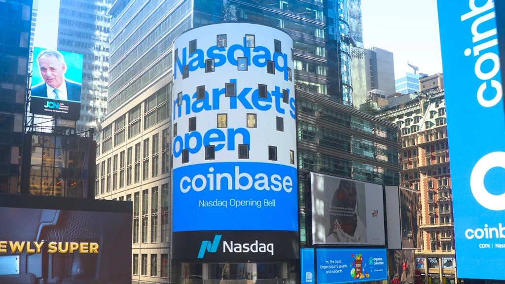 Coinbase Cuts 14% of Staff, Citing Crypto Downturn and AI Shift