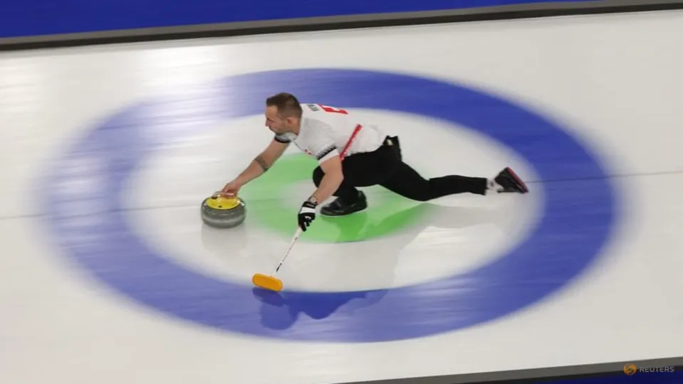 Olympic Sweethearts: Swiss Curling Couple Wins Medals Together