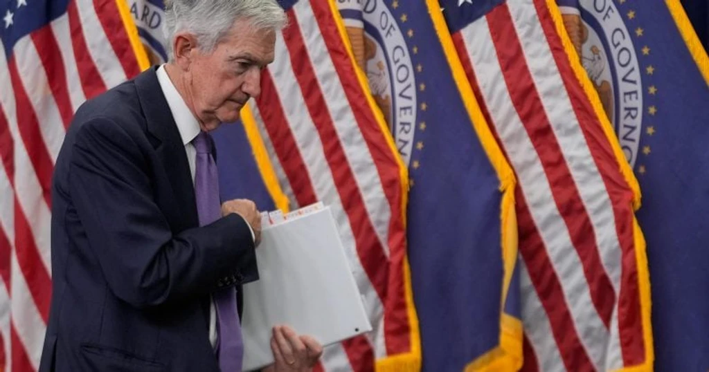 Fed Officials Now Project Rate Hikes Amid Inflation Surge