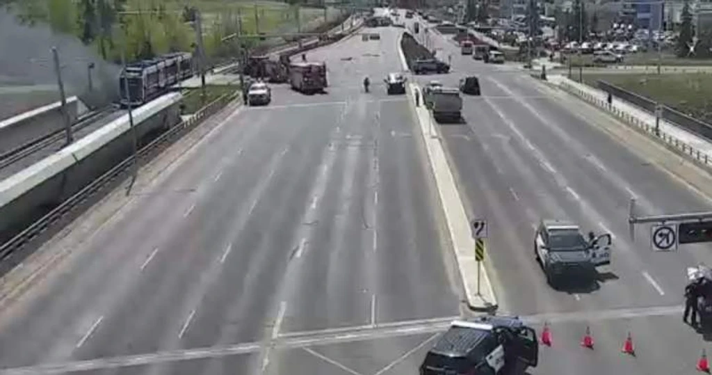 Tesla-LRT Crash Sparks Fire, Shuts Down Edmonton Overpass