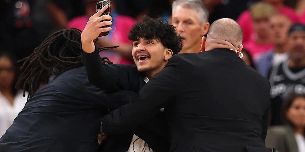 Fan Breaks onto Court for Selfie with Wembanyama During NBA Finals