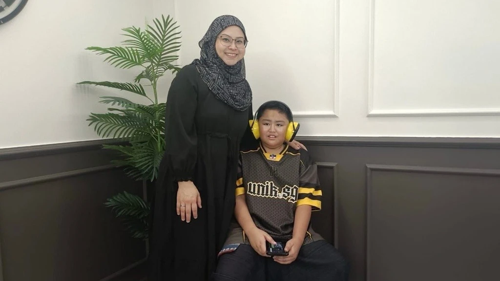A Mother's Plea to the Public: Don't Just Stare, Give Us a Smile
