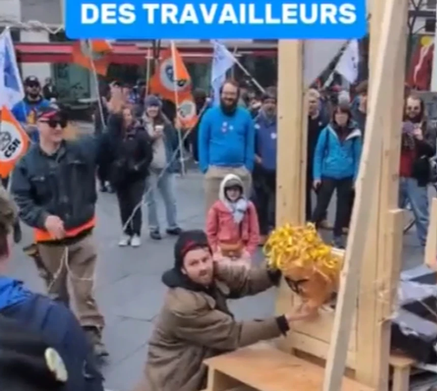 Montreal Police Probe Mock Beheading of Quebec Minister at Rally