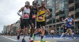 Boston Marathon: Runners Unite to Help Collapsed Competitor Finish