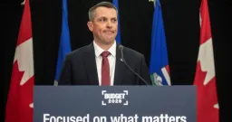 Alberta Finance Minister Questions Province's Tax Structure Amidst $9.4 Billion Deficit