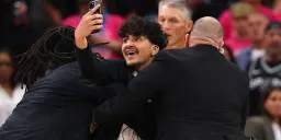 Fan Breaks onto Court for Selfie with Wembanyama During NBA Finals
