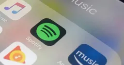 AI Music Surge Overwhelms Streaming Platforms, Threatens Human Artists
