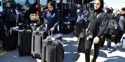 Iranian women's soccer team returns home after asylum offers in Australia