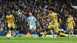 Manchester City Cuts Arsenal's Lead to Two Points with Dominant Win
