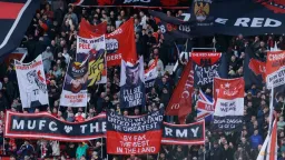Man Utd Fans Counter Ratcliffe's Immigration Remarks with Player Banner