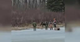 Heroic Ice Rescue: Moose Saved from Frigid Manitoba Waters