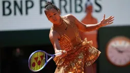 Naomi Osaka Stuns at French Open in Golden Dress Amid Fashion Controversy