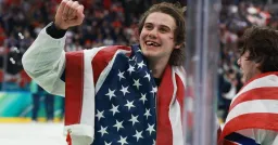 Iconic Toothless Grin: Photographer Captures U.S. Hockey Gold Medal Glory