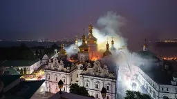 Russian Missile Barrage Kills Nine, Engulfs Kyiv Cathedral