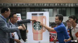 South Korean Police Question Shinsegae Executive Over Starbucks Tank Day Controversy