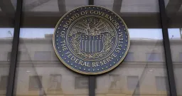 Fed Holds Rates Steady, Hints at Future Cuts Amidst Internal Division