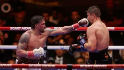 Usyk Stops Verhoeven in 11th, Avoids Epic Upset at Giza