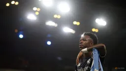 Vinicius Jr Scores Twice as Real Madrid Advances in Champions League