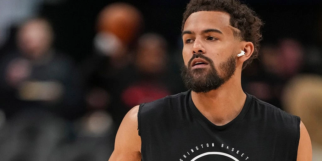 Wizards' Trae Young Ejected in Team's Loss, Awaiting Debut